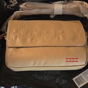 Peace Love World Tan Crossbody Bag with Embossed Design